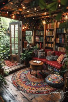 a living room filled with furniture and lots of books