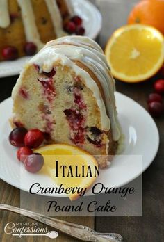 italian cranberry orange pound cake with icing on a white plate next to an orange slice