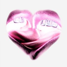 a pink heart shaped object with the word soul on it's face and eyes