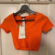 Orange Ribbed Crop Top. The Neck Scoops Down. Bought For A Neon Party But Didn’t End Up Wearing It. It’s Super Cute! Ribbed Cropped Party Tops, Cropped Ribbed Party Top, Trendy Ribbed Party Tops, Ribbed V-neck Top For Parties, V-neck Ribbed Top For Parties, Party Ribbed V-neck Top, V-neck Ribbed Party Top, Party V-neck Ribbed Top, Fitted Seamless Zara Crop Top