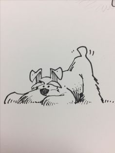 a black and white drawing of a dog laying on the ground next to another dog