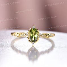 Dianty Peridot Engagement Ring Set,Silver Yellow Gold,Vintage August Birthstone Ring,Art Moissanite Wedding Ring,Micro Pave Stack Ring Gift -------------------------------------------------------------------------------------------------------------------------- The August birthstone, peridot, symbolizes strength. August is a lucky month, as it has not one, but three beautiful birthstones. If you're born in August or are shopping for an August birthstone, you'll have three gemstones to choose fr Elegant Peridot Birthstone Ring For Wedding, Elegant Peridot Wedding Birthstone Ring, Round Peridot Crystal Wedding Ring, Wedding Jewelry With Peridot In Halo Setting, Elegant Peridot Crystal Ring For Anniversary, Peridot Crystal Wedding Ring, Peridot Crystal Ring For Wedding, Green Solitaire Crystal Wedding Ring, Peridot Diamond Wedding Ring