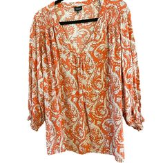 Jones & Co Women's Burnt Orange Floral Bohemian Blouse Plus Size 3X Smocked Fall Item is in good, pre-owned condition.  No issues noted with the blouse.  The item has been laundered according to garment specifications. Content: Rayon Measurements are approximately as follows: Armpit to armpit: 30" Back of collar to bottom hem: 28" We ship most items out the next business day.  Please contact us with any questions.  We are happy to combine shipping when possible. Thank you! 2359 Features: * Boehmian Size: Womens 3X Condition: Pre-Owned Good Bohemian Fall Blouse With Smocked Bodice, Bohemian Smocked Bodice Blouse For Fall, Bohemian Blouse With Smocked Bodice For Fall, Bohemian Blouse With Smocked Bodice For Vacation, Fall Vacation Blouse With Smocked Bodice, Bohemian Smock Blouse For Daywear, Patterned Long Sleeve Peasant Blouse, Bohemian Blouse, Blouse Plus Size