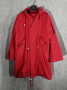 Ralph Lauren vintage red rain jacket with hood, multiple drawstrings, pockets. Overall great condition, couple tiny blemishes. Size Large. Pit to pit: 23" Length: 36" Shoulders: 22" Shoulder to cuff: 22" Red Windbreaker With Detachable Hood For Fall, Fall Red Windbreaker With Detachable Hood, Red Hooded Parka For Outdoor, Red Double-lined Hooded Outerwear For Fall, Red Parka With Pockets For Fall, Red Hooded Outerwear With Pockets, Vintage Ralph Lauren Outerwear, Red Hooded Jacket With Pockets For Cold Weather, Red Vintage Windbreaker For Winter