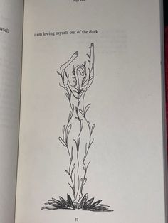 an open book with a drawing of a woman standing in the grass and holding her arms up