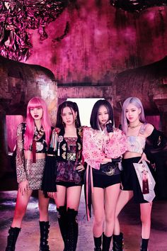 the blackpink band is posing for a photo