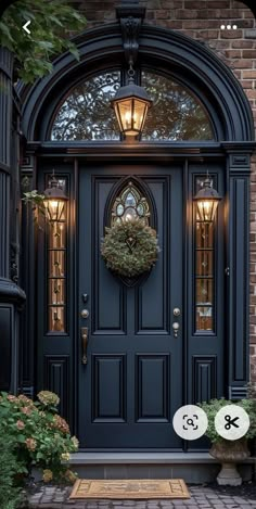 a blue front door with a wreath on it