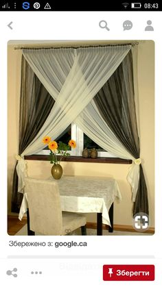 an image of a dining room with curtains