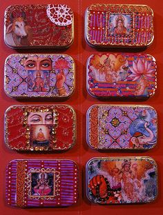 six tin trays with paintings on them