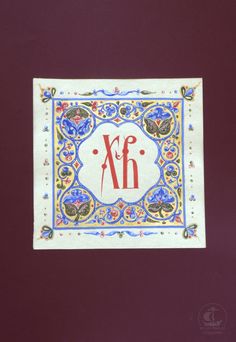 a decorative tile with the letter f on it