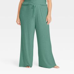 These Cozy Ribbed Wide-Leg Pants from Auden™ will keep you nice and comfy as you lounge about the house. Made from lightweight, super-cozy soft-brushed rib fabric with spandex, these mid-rise pants feature a full elastic waistband with a drawstring to help you find your perfect fit. Cut to an ankle length, they also feature wide, flared legs for a touch of chic style. Auden™: Comfort true to every shape & hue. Comfy Relaxed Fit Bottoms For Home, Comfy Relaxed Fit Bottoms For Relaxing At Home, Comfy Bottoms With Relaxed Fit For Home Relaxation, Comfortable Bottoms With Elastic Waistband For Home, Comfortable Bottoms With Elastic Waistband For Relaxing At Home, Cozy Solid Color Bottoms For Relaxation, Comfortable Solid Color Lounge Pants, Solid Color Harem Loungewear Pants, Comfortable Soft Solid Color Pants