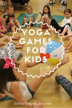 young children sitting on the floor playing with yoga balls in a circle and text overlay reading yoga games for kids