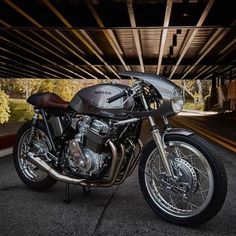 a motorcycle is parked under an overpass