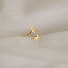 D U O ∙ P E T ∙ I N I T I A L ∙ R I N G * Material: High Quality Solid 925 Sterling Silver * Dimensions: ~4mm Charm Height | 1mm band * Finish: Sterling Silver ∙ 18K Gold ∙ Rose Gold * All our work is custom made by hand with Love and Care in our workshop ♡ H O W ∙ T O ∙ O R D E R * Simply use the 'PERSONALIZATION BOX' upon ordering to let us know your INITIAL, PET DESIGN NUMBER from our Pet Chart, and FONT NUMBER you would like. ♡ TOP INITIAL + BOTTOM PET DESIGN NUMBER + FONT NUMBER ♡ * If you Number Font, Pet Design, Pet Memorial Jewelry, Font Number, Design Number, Handmade Pet, Wrap Ring, Midi Rings, Memorial Jewelry