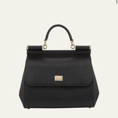 100% Guaranteed Authentic Condition: New , Excellent .No Used Come With Store Tags . Come With Dust Bag . Color: Black Size: 10"W X 7.5"H X 5"D : H22 X W25 X D12 Cm Descriptions: Dolce & Gabbana Textured Calfskin Satchel Bag. Tote Handle With Rings; 3.5”Drop. Adjustable Detachable Shoulder Strap; 20" -27”Drop. Edged Flap Top With Logo Plaque; Snap Closure. Inside, Slide Pocket With Mirror; Animal-Print Fabric Lining. Feet Protect Bottom Of Bag. External Composition: 100% Calfskin Internal Composition: 80% Cotton 20% Calfskin "Sicily" Is Made In Italy. Luxury Satchel With Removable Pouch, Designer Top Handle Evening Bag, Luxury Clutch Evening Bag With Handle Drop, Designer Evening Bag For Travel, Luxury Evening Clutch With Handle Drop, Luxury Everyday Clutch Bag, Designer Evening Bag With Top Handle For Everyday Luxury, Elegant Everyday Luxury Clutch Bag, Designer Formal Evening Bag With Handle Drop