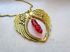 Inspired on Kyrie's necklace from the DMC series, this necklace is perfect for all those who want to show their love for the series or Kyrie (of Nero) herself. It has a pair of golden wings surrounding a red agate (red, amber and transparent hues) stone pendant, hanging between them. ▼▲ Other DMC Inspired Items ▼▲ ● So... Devils Cry, Huh? (Necklace): https://www.etsy.com/listing/707006848/so-devils-cry-huh-devil-may-cry-nero ● The Red Queen (Keychain): https://www.etsy.com/listing/1002660264/the Wire Wrapped Brass Necklace For Gift, Gold Necklace With Heart Pendant, Royal Au, Nero Dmc, The Red Queen, Oc Reference, Reference Board, Golden Wings, I'll Wait