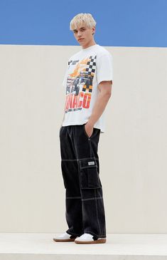 Step into bold style with the PacSun Black Extreme Baggy Cargo Jeans. Boasting side, traditional back, and large cargo pockets with a woven PacSun tag, these jeans are both functional and fashionable. With contrast stitching and an extreme baggy fit leading to a wide leg opening, these jeans redefine streetwear with a statement-making look.Model is wearing size 32Model Measurements: 6'0” Height, 28" Waist, 34” Chest, 32” HipsLearn more about PacSun eco items PacSun Mens Black Extreme Baggy Cargo Men Cargo Pants Outfit, Band Outfits, Outfits Rave, Cargo Pants Outfit, Bold Style, Cargo Jeans