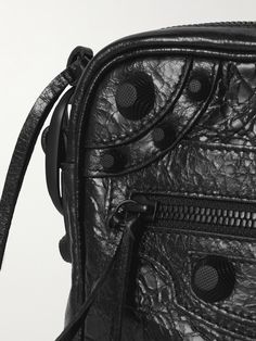 Balenciaga's iconic 'City' bag was first released in the early 2000s. An ode to the original design, this 'Le Cagole' messenger is crafted from cracked-leather embellished simply with tonal studs. Slip your wallet into the zipped pocket for easy access. Messenger Bag For Men, Balenciaga Men, Black Balenciaga, The Early 2000s, Balenciaga Black, Latest Bags, Black Accessories, Messenger Bag Men, City Bag