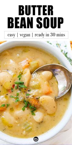 a bowl of butter bean soup with a spoon in it and the title overlay reads, butter bean soup