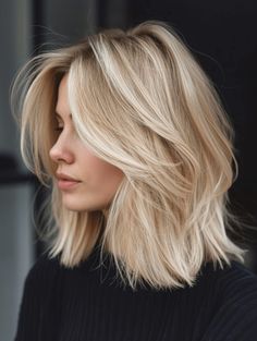 The blond lob is the quintessence of spring’s vivacity. This haircut is a modern-day charm, with its perfect balance between the shortish vibe of a bob and the manageability of medium short layered hair. Its subtle layers bring out a thick bob appeal that’s neither too heavy nor too light, perfect for those with haircuts shoulder length thick hair. The color is a delightful mix of golden and ashy hues, offering a sun-kissed glow that’s ideal for the warmer days ahead. Shoulder Length Blonde, Spring Haircuts, Blonde Hair Transformations, Blonde Hair Inspiration, Blonde Hair Looks, Shoulder Length Hair Cuts, Short Blonde Hair, American Beauty, Shoulder Length Hair