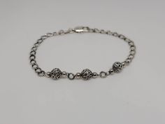 925 Silver Ornate Ball link Bracelet Item w# 1603 Clean and in good condition 7.25 inches long Elegant Silver Engraved Beaded Bracelets, Elegant Engraved Silver Beaded Bracelets, Silver Engraved Round Bead Bracelets, Silver Engraved Round Beads Bracelet, Antique Hallmarked Sterling Silver Bracelet, Hallmarked Vintage Sterling Silver Bracelet, Ornate Adjustable Nickel-free Bracelets, Vintage Nickel-free Sterling Silver Bracelet In Antique Silver, Luxury Vintage Hallmarked Sterling Silver Bracelet