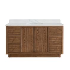 a bathroom vanity with a white counter top and wooden cabinet doors on one side, and a sink on the other