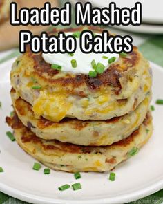 loaded mashed potato cakes on a white plate