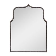 an ornate mirror on a white background