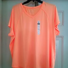 Nwt..Orange Quick-Dri Short Sleeve Curved Hem Top By Xersion. Size 2x Orange Stretch Sports Tops, Orange Sports Tops For Summer, Orange Stretch Tops For Sports, Stretch Orange Tops For Sports, Orange Short Sleeve Workout Top, Spring Orange Activewear For Sports, Orange Athleisure Tops For Sports, Orange Stretch Casual Activewear, Casual Workout Tops In Orange