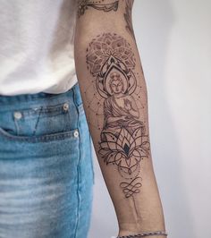 a woman with a tattoo on her arm