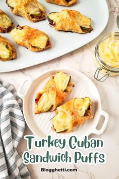 turkey cuban sandwich puffs on a white plate