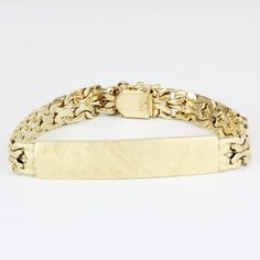 Introducing A Stunning Vintage 14k Brushed Yellow Gold Fancy Link Identity Id Bracelet, A True Work Of Art And A Timeless Accessory That Will Never Go Out Of Style. The Solid 14 Karat Yellow Gold Band Boasts A Unique And Eye-Catching Design, While The Brushed Gold Id Plate Adds An Extra Touch Of Sophistication. This Magnificent Piece Measures 7.25" In Length And Features A Sturdy Clasp Stamped With "14k" For Authenticity. The Id Plate Itself Is 43mm Long And 9mm Wide, Providing Ample Space For Personalization. Whether Worn As A Statement Piece Or As A Subtle Addition To Your Outfit, This Bracelet Is Sure To Turn Heads And Spark Admiration. Don't Miss Out On The Chance To Add This Exquisite V Vintage Brush, Id Bracelets, Fine Jewelry Bracelets, Mens Accessories Jewelry, Timeless Accessories, Gold Band, Solid Yellow, Name Plate, Style Ideas