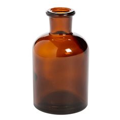 an empty brown glass bottle on a white background