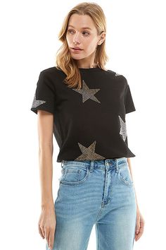 Shine on in this cute knit tee. Gold Studded Star Knit Tee Color - Black Cotton Fits True To Size Affordable Star Print Graphic Tee, Affordable Star Print T-shirt For Spring, Cheap Cotton T-shirt With Star Patch, Trendy Cheap Star Print T-shirt, Cheap Trendy Star Print T-shirt, Cheap Graphic Tee With Star Print, Cheap Short Sleeve Tops With Star Patch, Cheap Short Sleeve T-shirt With Star Logo, Shimmer Blouse