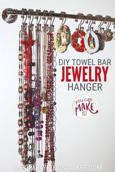 there is a sign that says diy towel bar jewelry hanger