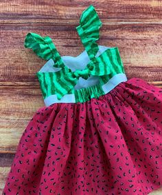 Your summer loving little girl will love her fun watermelon twirl dress!!  So perfect for a picnic, a garden party, a birthday gift or everyday fun with the perfect twirling factor! The bodice features a sweetheart neckline and is lined in a white cotton fabric.  The keyhole back ties with a knot with elastic at the back for a comfortable fit. The dress is easy care 100% cotton with the perfect twirling factor!  So much fun for play, parties and dress up occasions. There is an option available for flutter sleeves for a little dressier look. FINISHING:  All creations from Little Giggle Shop have been handmade in a smoke-free home with a Grandmother's Love. I take great pride in the quality of my designs.  The time is taken to professionally finish all edges which helps to prevent fraying in Watermelon Picnic, One In A Melon Birthday, Party Dress Summer, Watermelon Dress, Grandmothers Love, Summer Loving, Picnic Dress, One In A Melon, Garden Party Dress