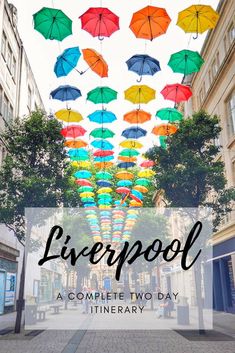 colorful umbrellas floating in the air with text overlay reading liverpool a complete two day itinerary