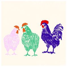 three colorful roosters standing next to each other