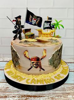 a decorated cake with pirates on it