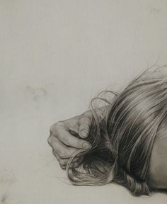 a pencil drawing of a woman's head and hands