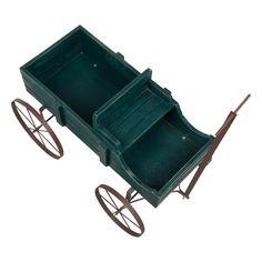 a green wooden wagon with wheels and two trays on each side, isolated against a white background