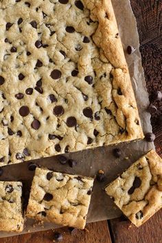 chocolate chip cookie bars cut into squares on a cutting board