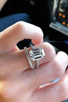 a woman's hand with a ring on it