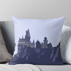 the hogwarts castle at night throw pillow