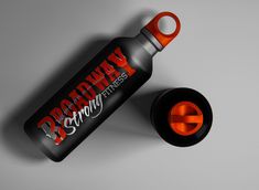 an orange and black water bottle with the word deathray on it's side