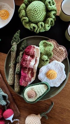 crocheted items are arranged on a table