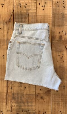 "High waisted 90's denim shorts. Made by Levi's in light blue denim wash. Shorts are in excellent clean condition. Perfectly worn in with light naturally distressed character. These have been cut off and washed once. Measurements are taken zipped or buttoned up and laid comfortably flat then x 2 for total circumference (inches) Levis 551 Tag Size 14 100% Cotton Made in USA Waist 33\" Hips 44\" Length 13.5\" Inseam 2.25\" Rise 12.5\" leg opening circumference 27\" All items are free of rips, tear Levis Jeans High Waisted, Levi High Waisted Shorts, Levis Mom Jeans, Shorts Levis, Levis Shorts, Light Wash Levis, 90s Levis, 90s Denim, Cutoff Shorts