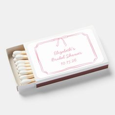 matches are in a box with the label on it that says, elizabeth's bridal shower