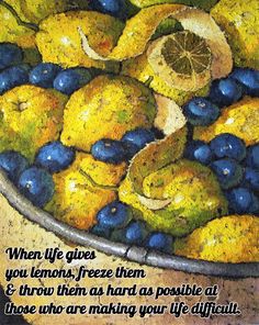 a bowl filled with blue and yellow fruit on top of a wooden table next to a quote that reads, when life gives you lemons freeze them & grow as hard as possible at those