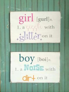 two wooden signs that say girl and boy on them, one is painted in different colors